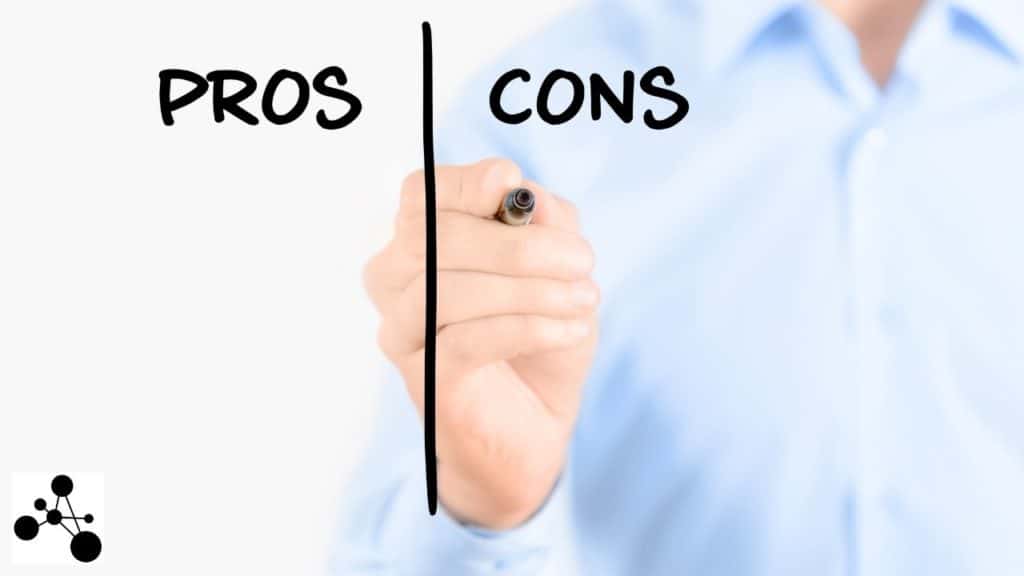 Image of a man writing pros and cons